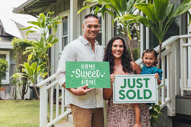 Family infront of home